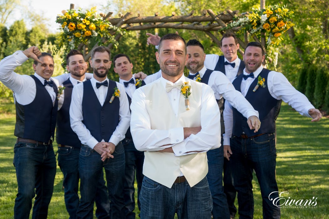 The groom poses with his amazing counterparts as they celebrate such an amazing day.