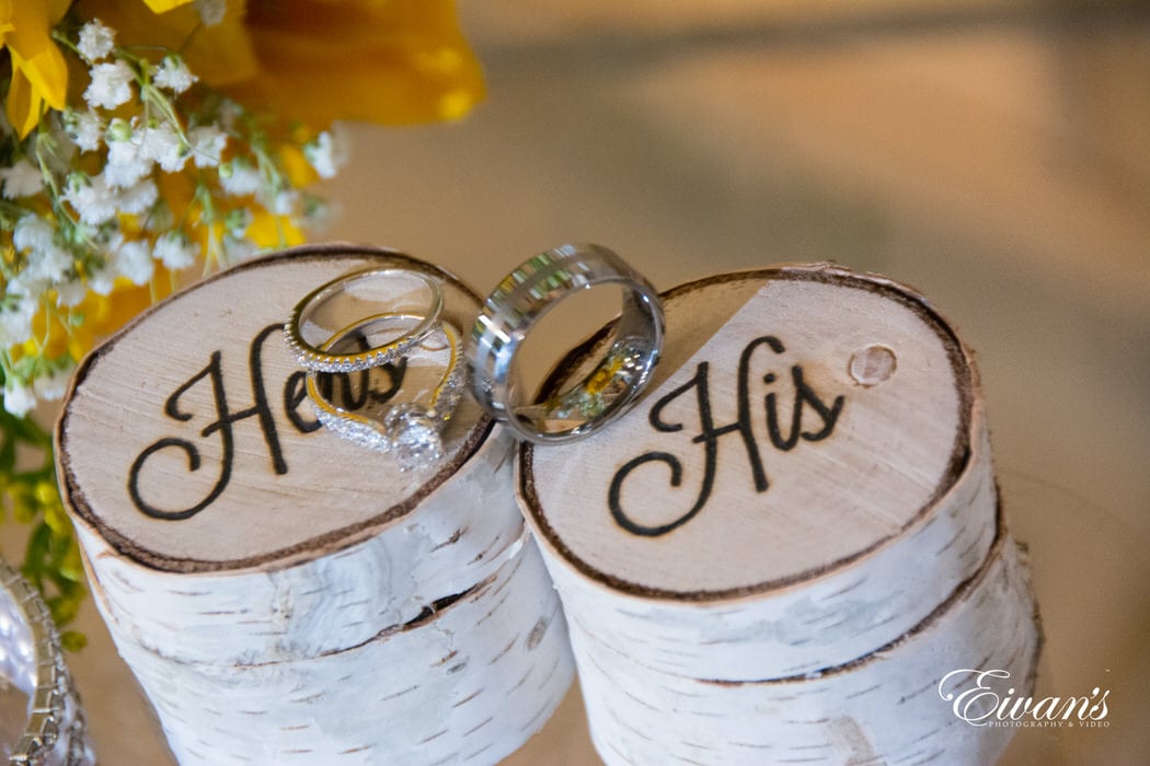 Small ring box that is in the shape of natural log pieces that not only hold the rings the couple will wear forever but also demonstrate their love.