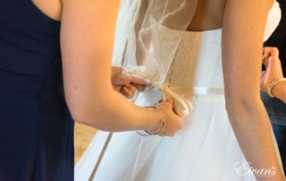 Having the ribbon being tied around her waist with a beaded belt simply adding to her gorgeous gown.