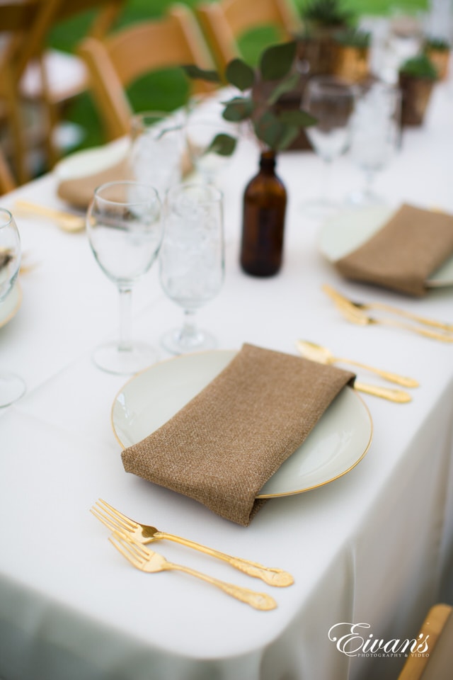 brown leather long wallet on white table