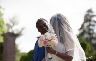 Walking to her handsome groom prepping to begin their married life and eternally overjoyed.