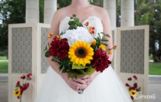 The bride's stunning bouquet is very bright and vibrant and entirely captures their perfect moment.