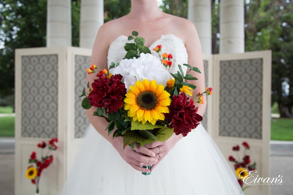 The bride's stunning bouquet is very bright and vibrant and entirely captures their perfect moment.