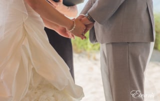 The couple hold hands in the process of finally vowing their love together.