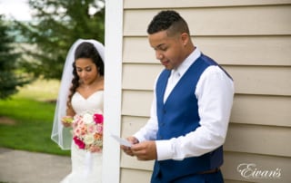 The bride and groom exchange notes about their love for one another.