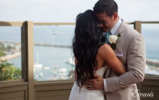 The groom embraces the love of his life entirely invested in this moment that he will remember for the rest of his life.