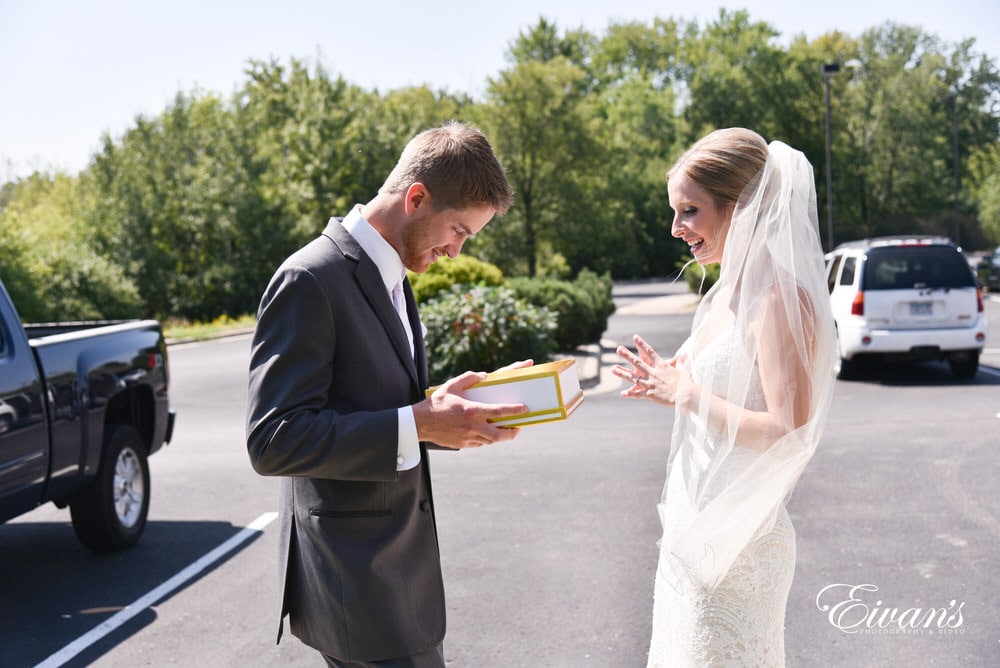 The groom is surprised by his bride's amazing gift that they get to share together.