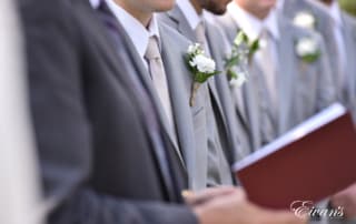 The groom stands at the alter awaiting his bride so they can begin their new life's together.