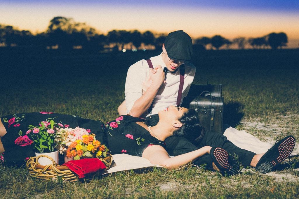 The vintage looks worn by this couple truly encompasses their particular style. To help truly capture this antique look the couple had old film cameras and beautiful flowers.