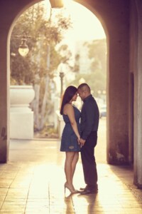 eivans_gallery_engagement_photos_155 This beautiful stone arch helps break up the gorgeous scenery and the bright yellow sun while this couple smiles and holds one another. Wholesome love completely describing the emotions flowing through this couple.