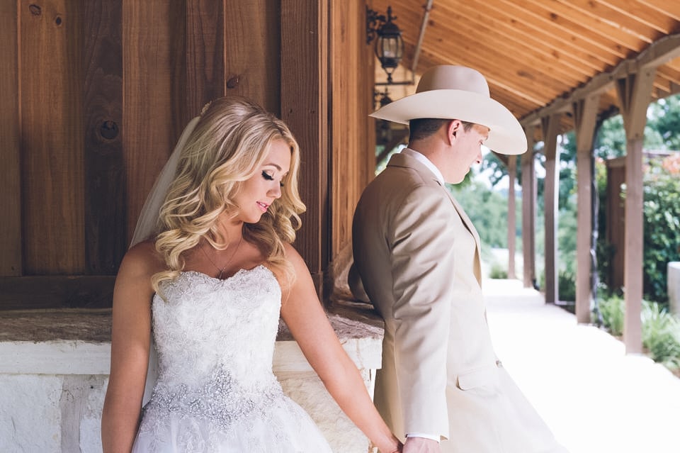 newlyweds holding hands from different corners, dallas wedding photographer availability