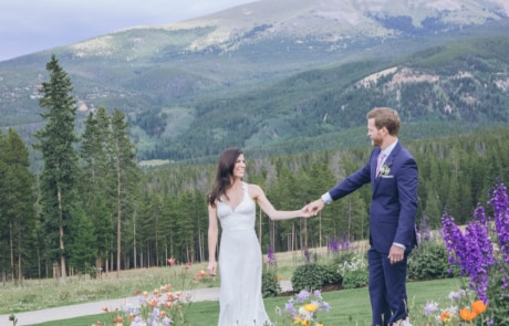 newlyweds posing at beautiful landscape, photographed by Eivan's in Denver