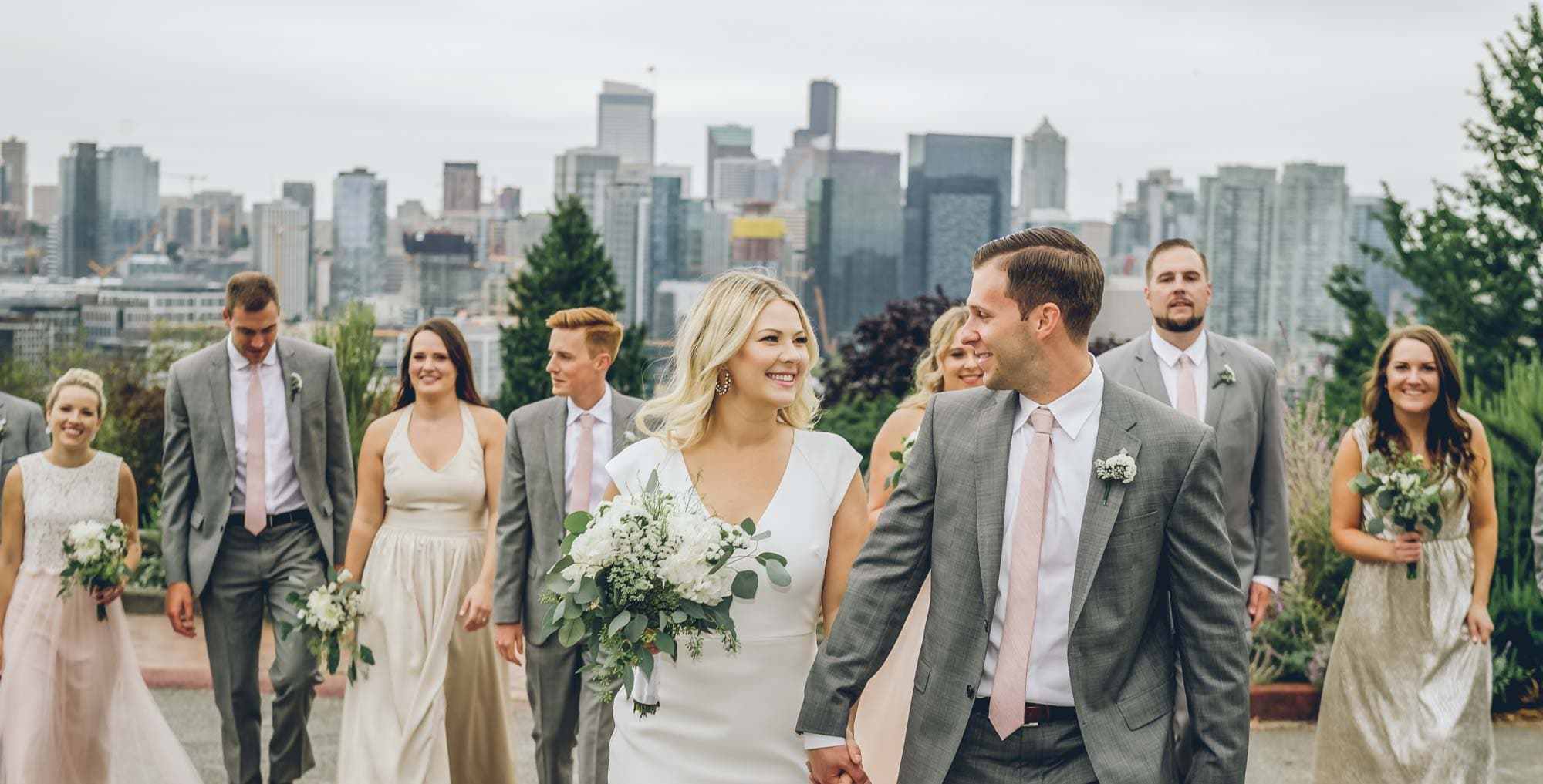 bridal party walking downtown seattle, photographed by Eivan's in Seattle.