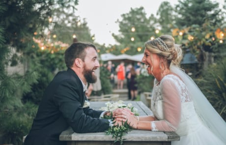 newlyweds sitting across from each other, cleveland wedding photographer portfolio