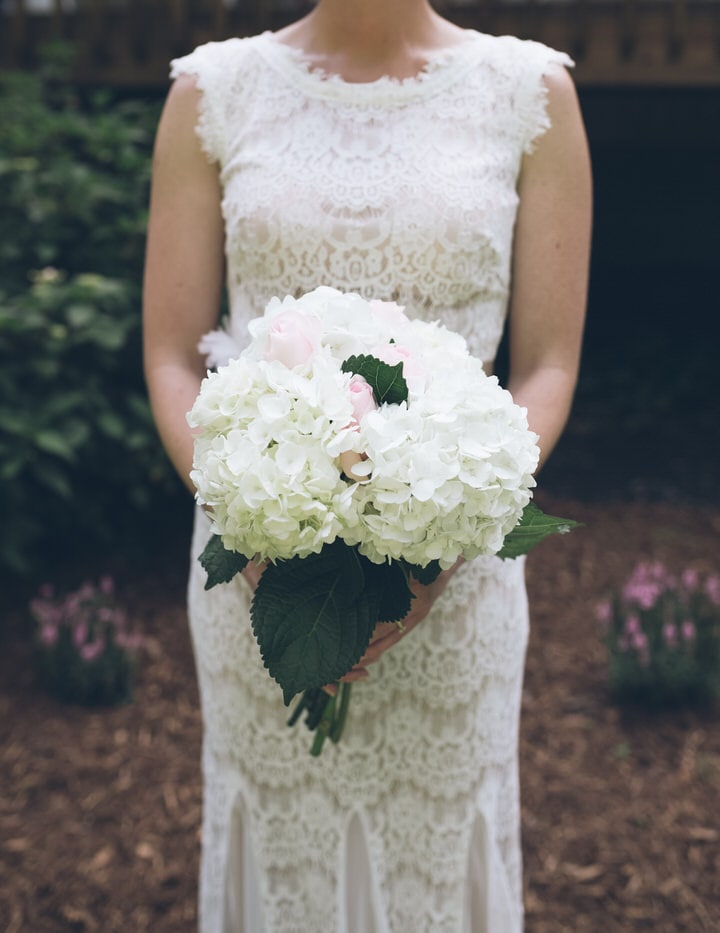 newlywed bride with bouquet, raleigh wedding photographer portfolio