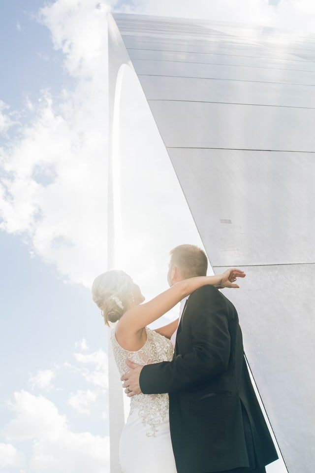 newlyweds sharing a moment, st louis wedding photographer packages and pricing