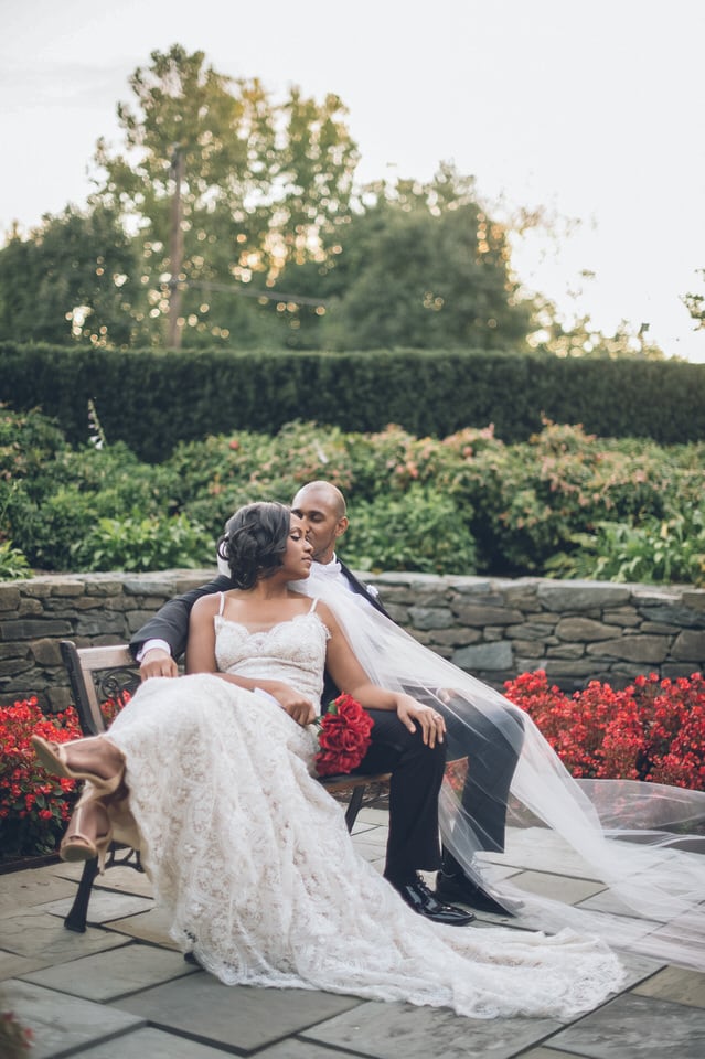 newlyweds sitting on a patio, washington wedding photographer packages and pricing