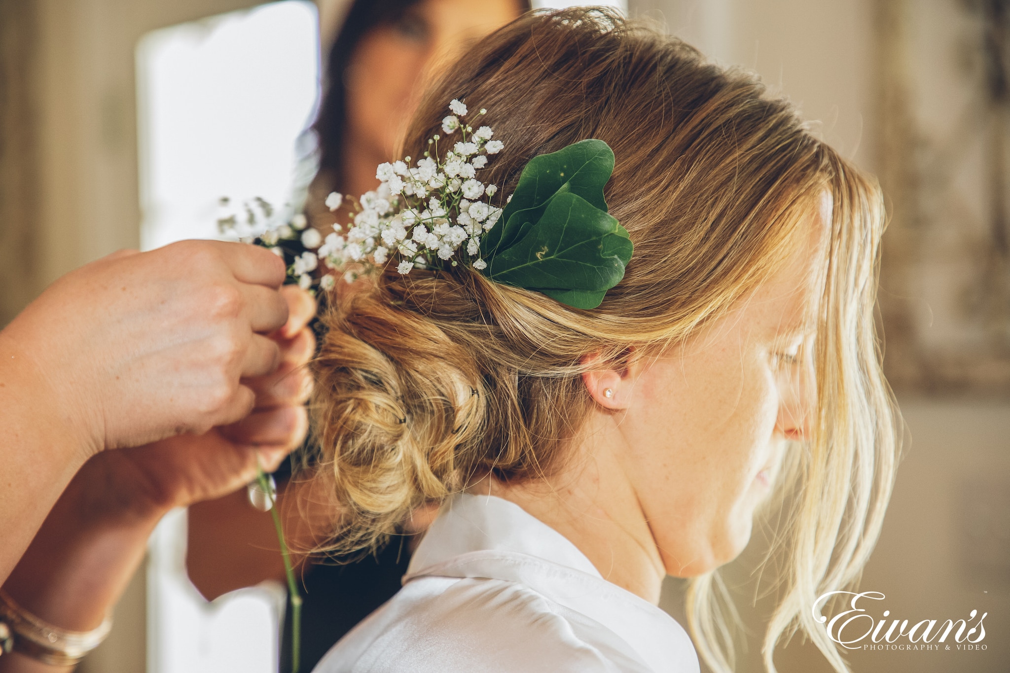 close up shot of woman with hair in an up-due