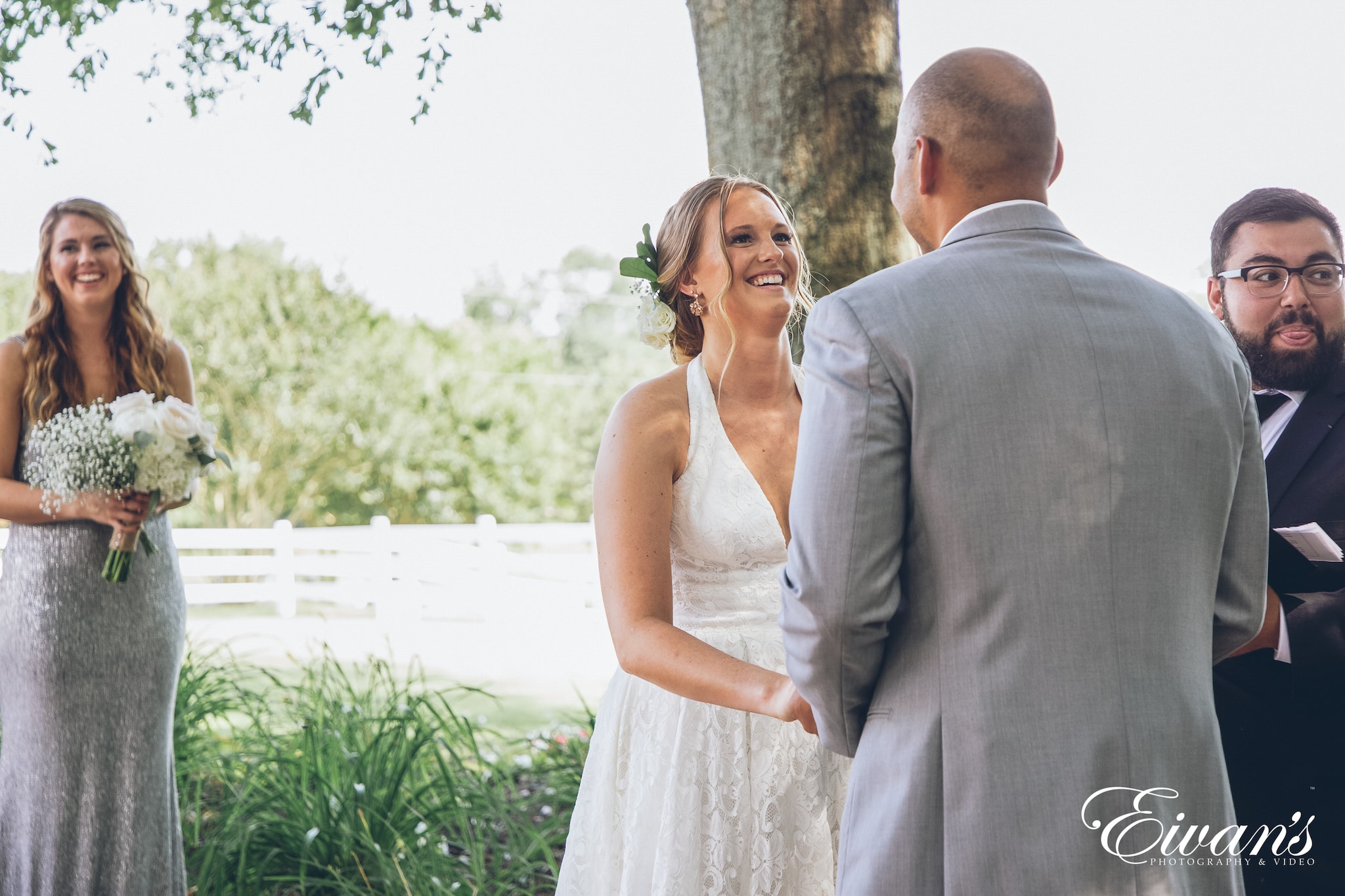 man and woman smiling at the alter