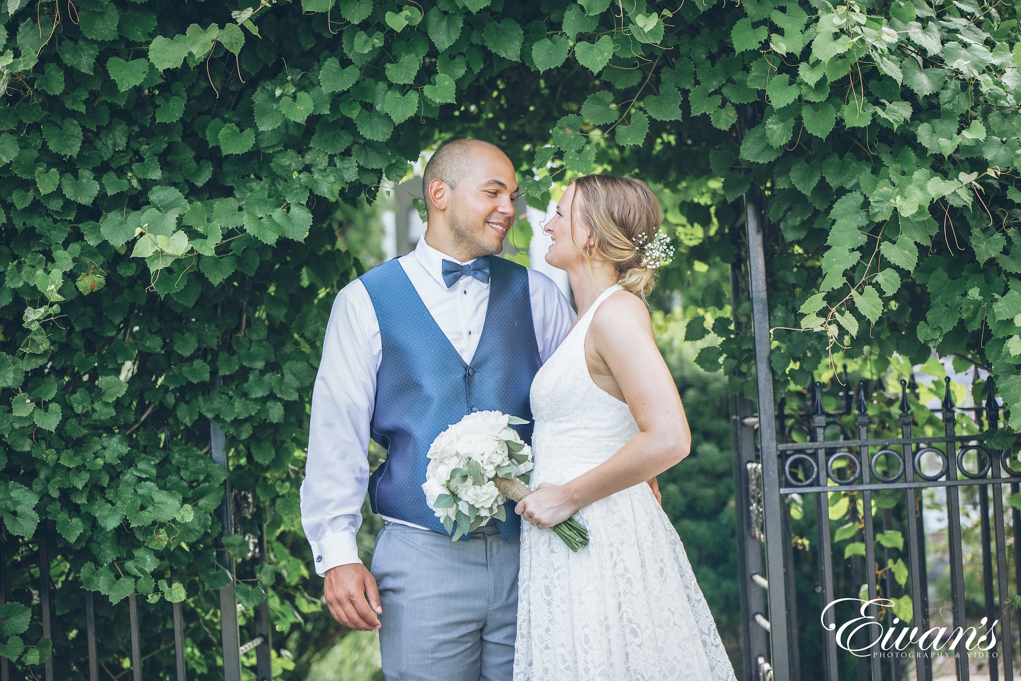 man and woman posed side by side