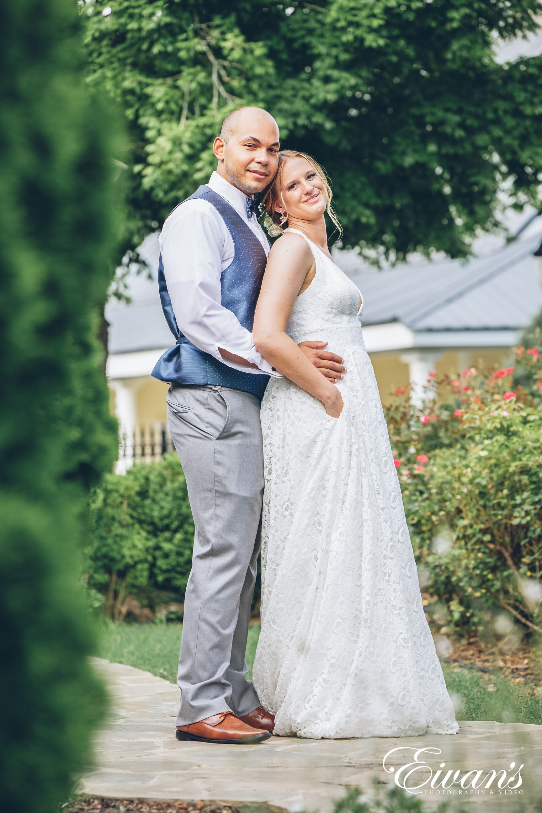 man and woman posed together side by side