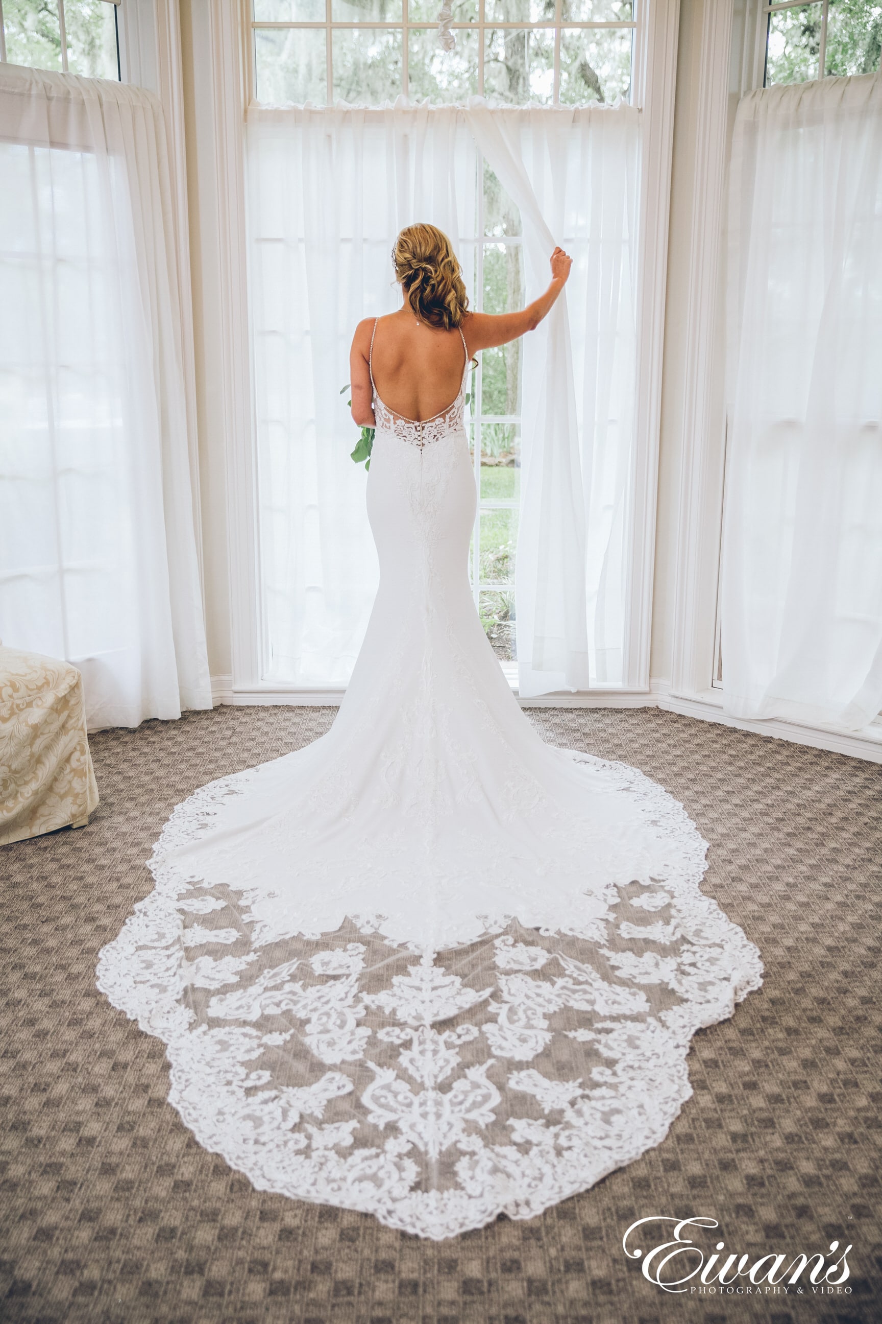 woman in white floral wedding dress