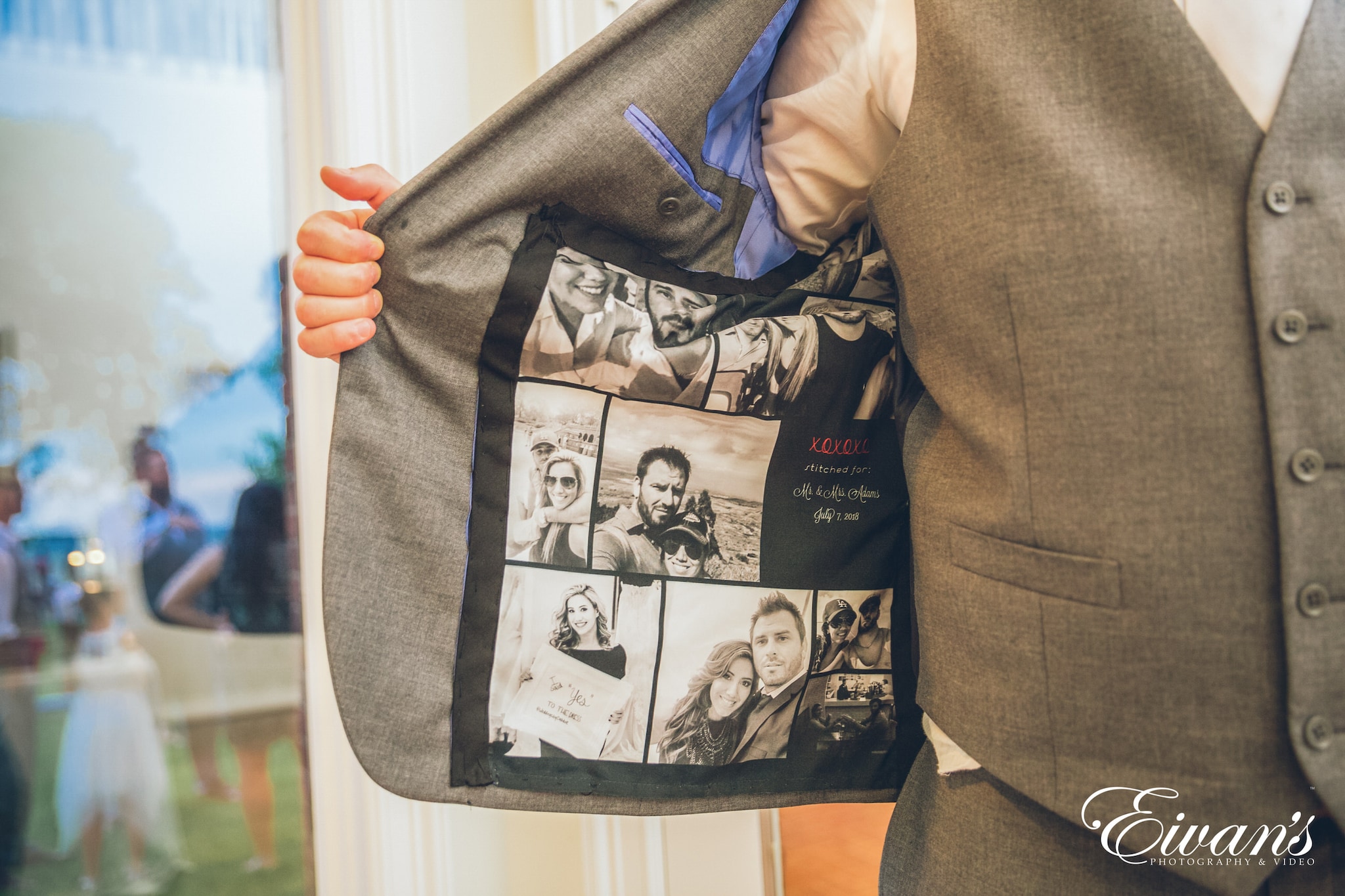 person holding black and white tote bag