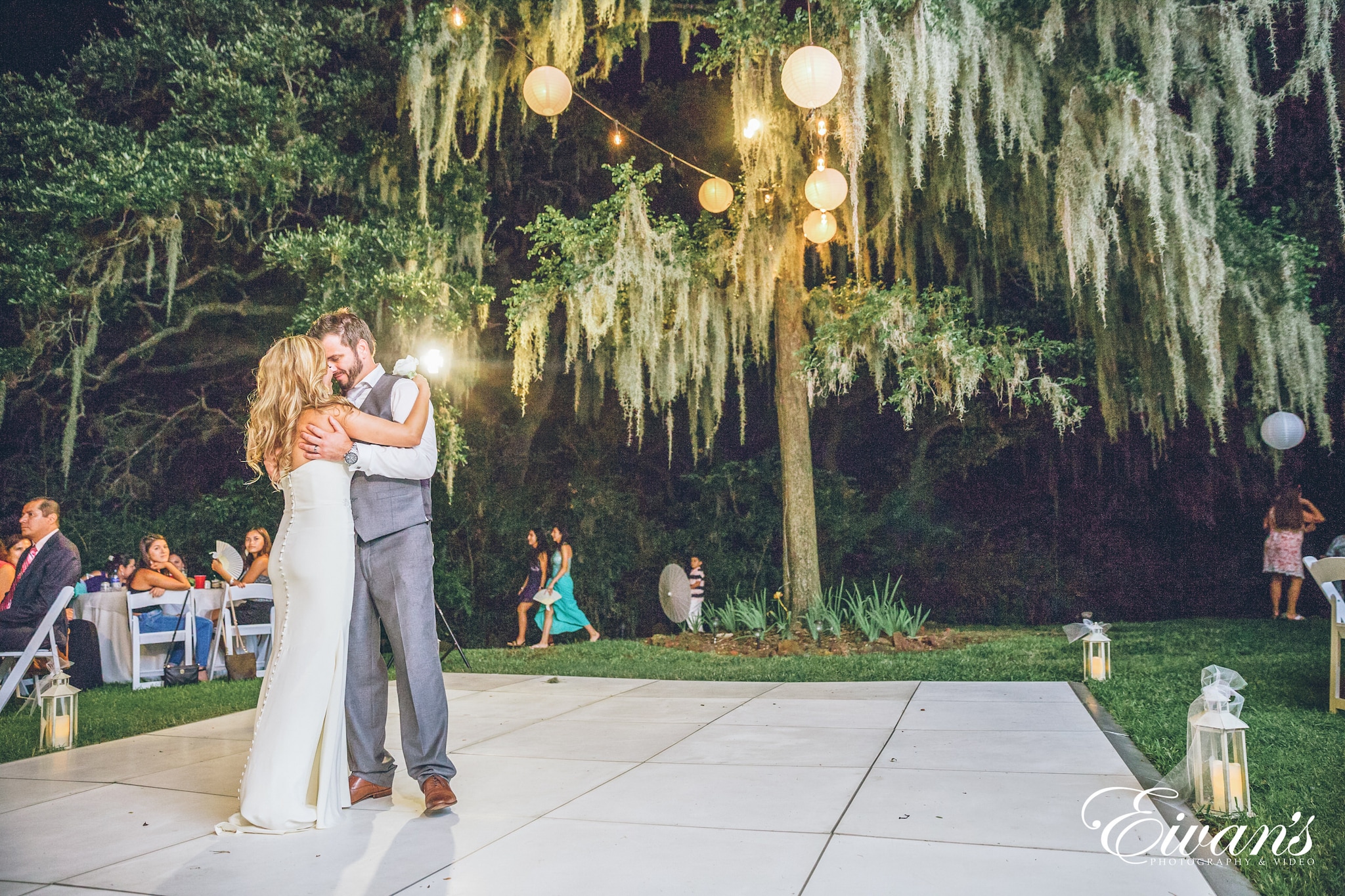 Wedding Photography woman in white dress hugging woman in white dress