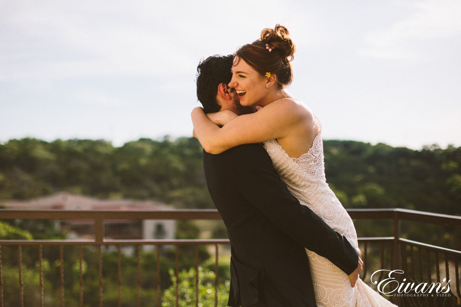 woman in white lace tank top kissing mans cheek