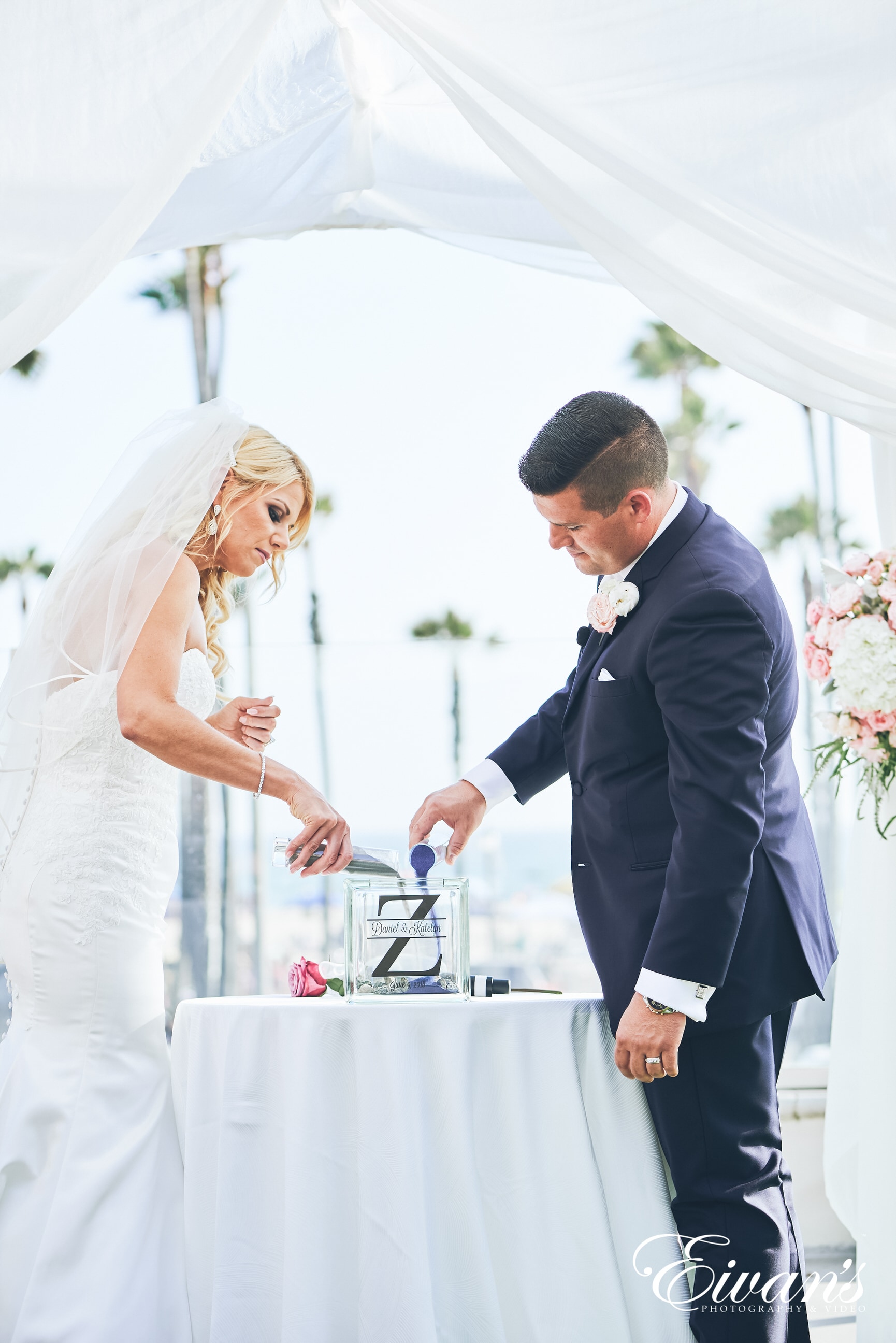 man and woman participating in a sand ceremony