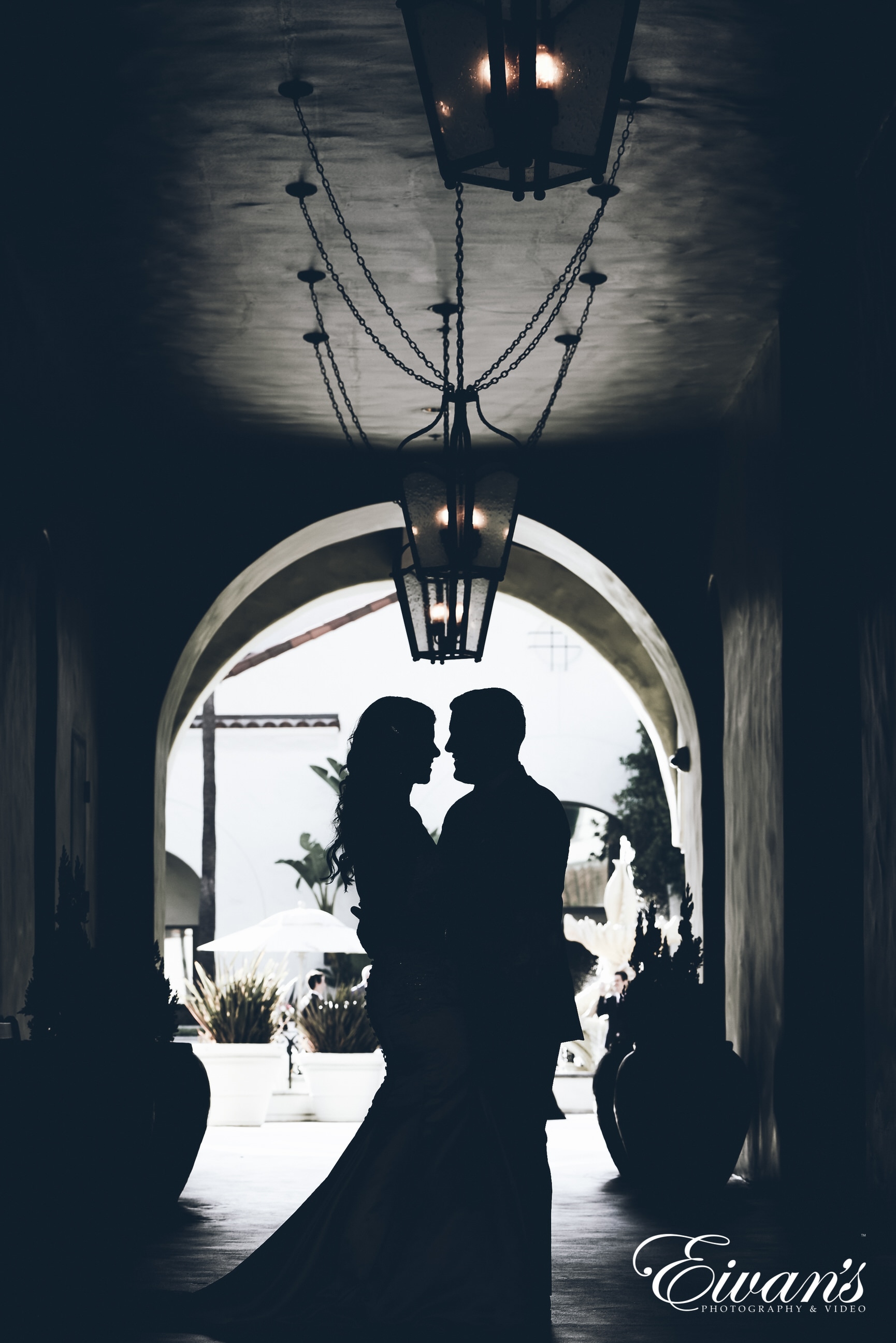 silhouette style picture of man and woman hugging