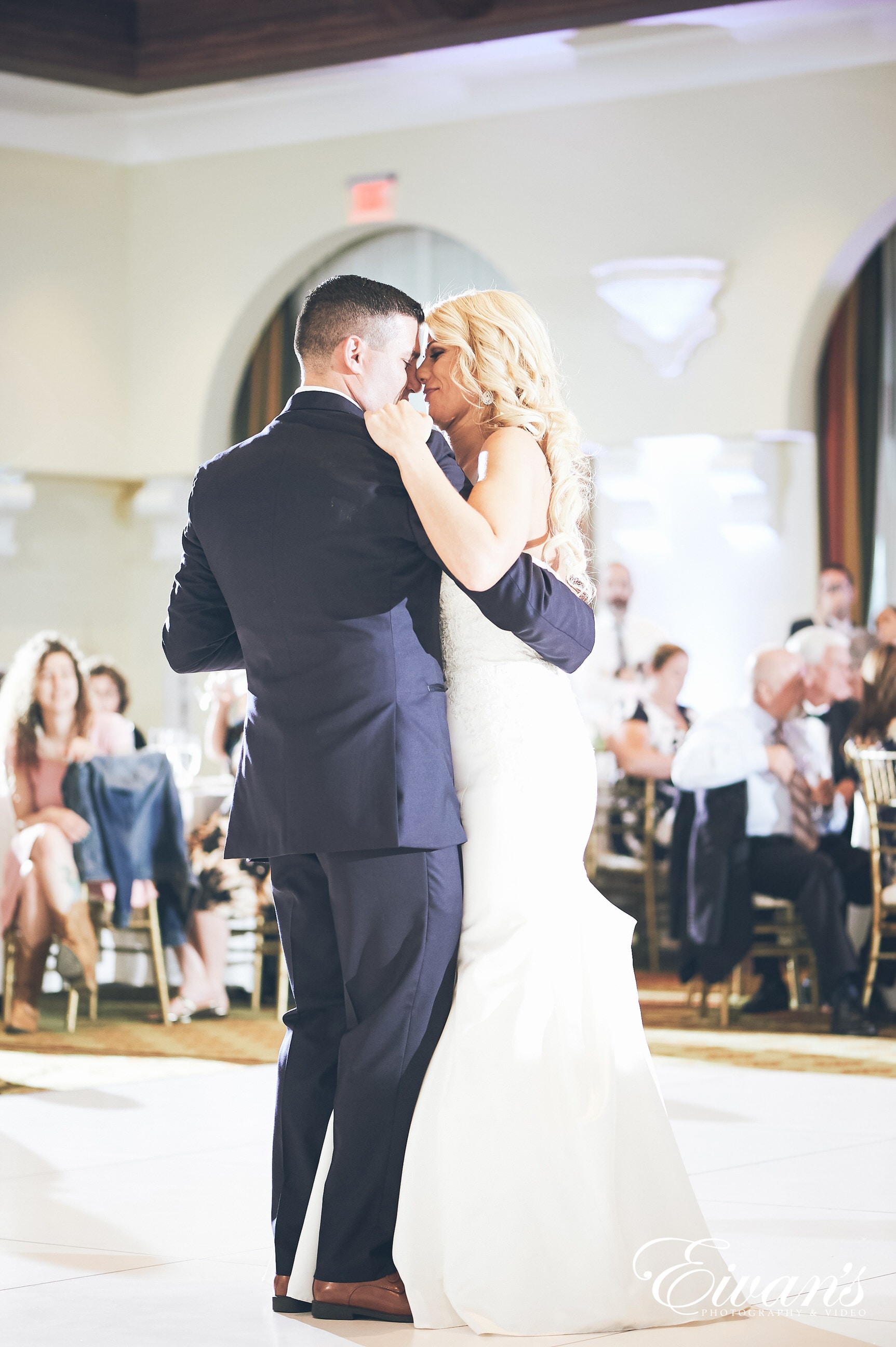 man and woman hugging on the dance floor