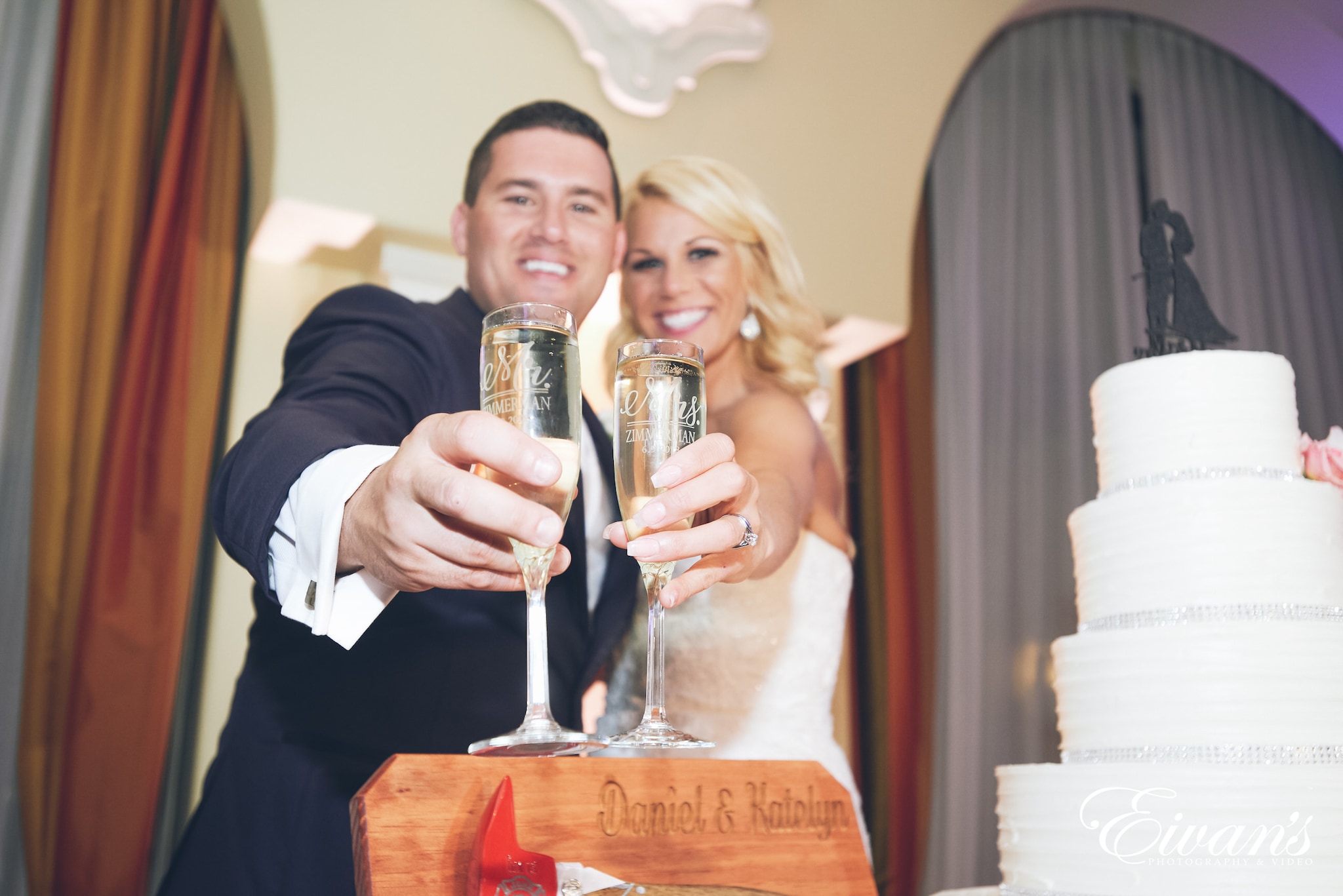 man and woman holding champagne glasses