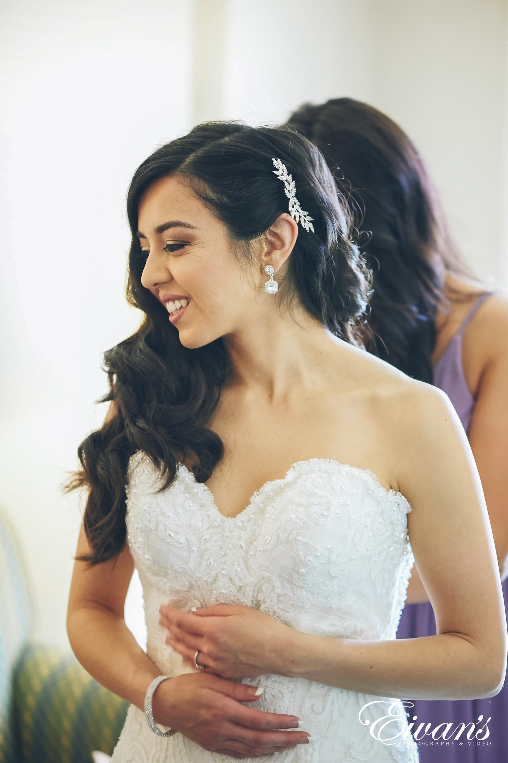 woman in a white dress getting ready