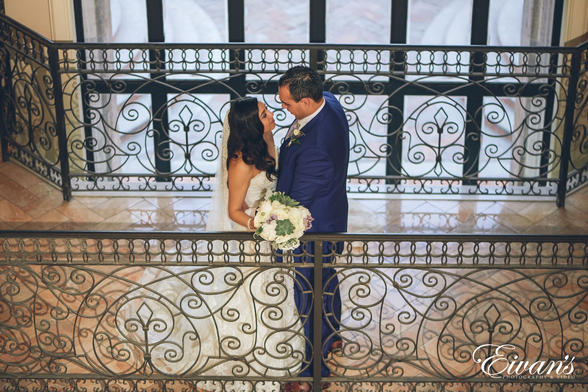 man and woman posed indoors