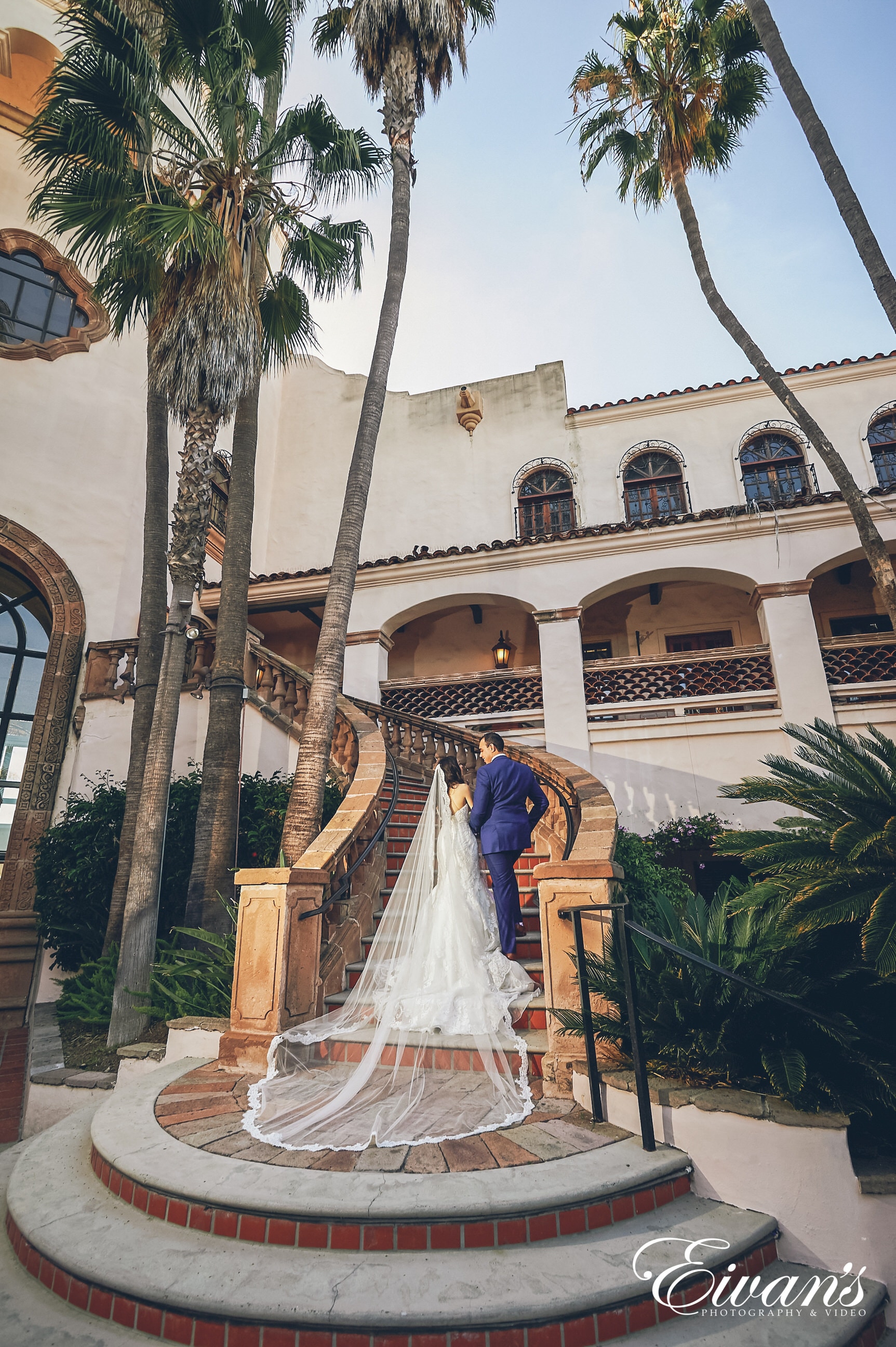 man and woman walking up the stairs