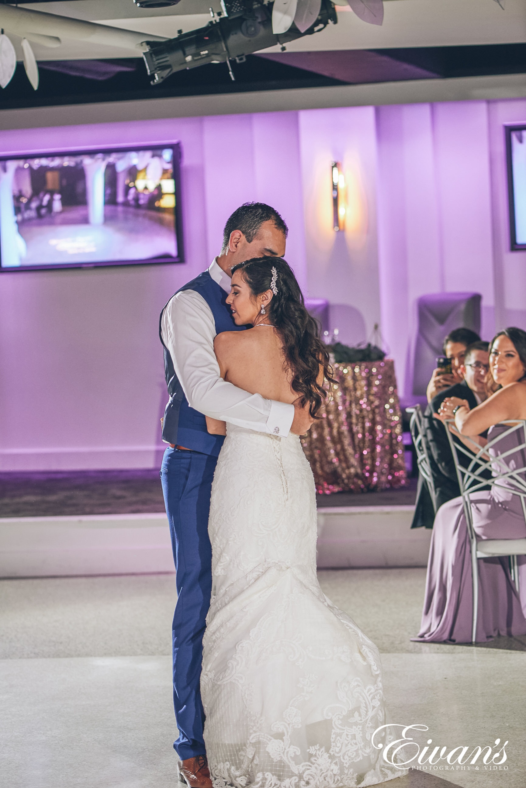 man and woman hugging on the dance floor