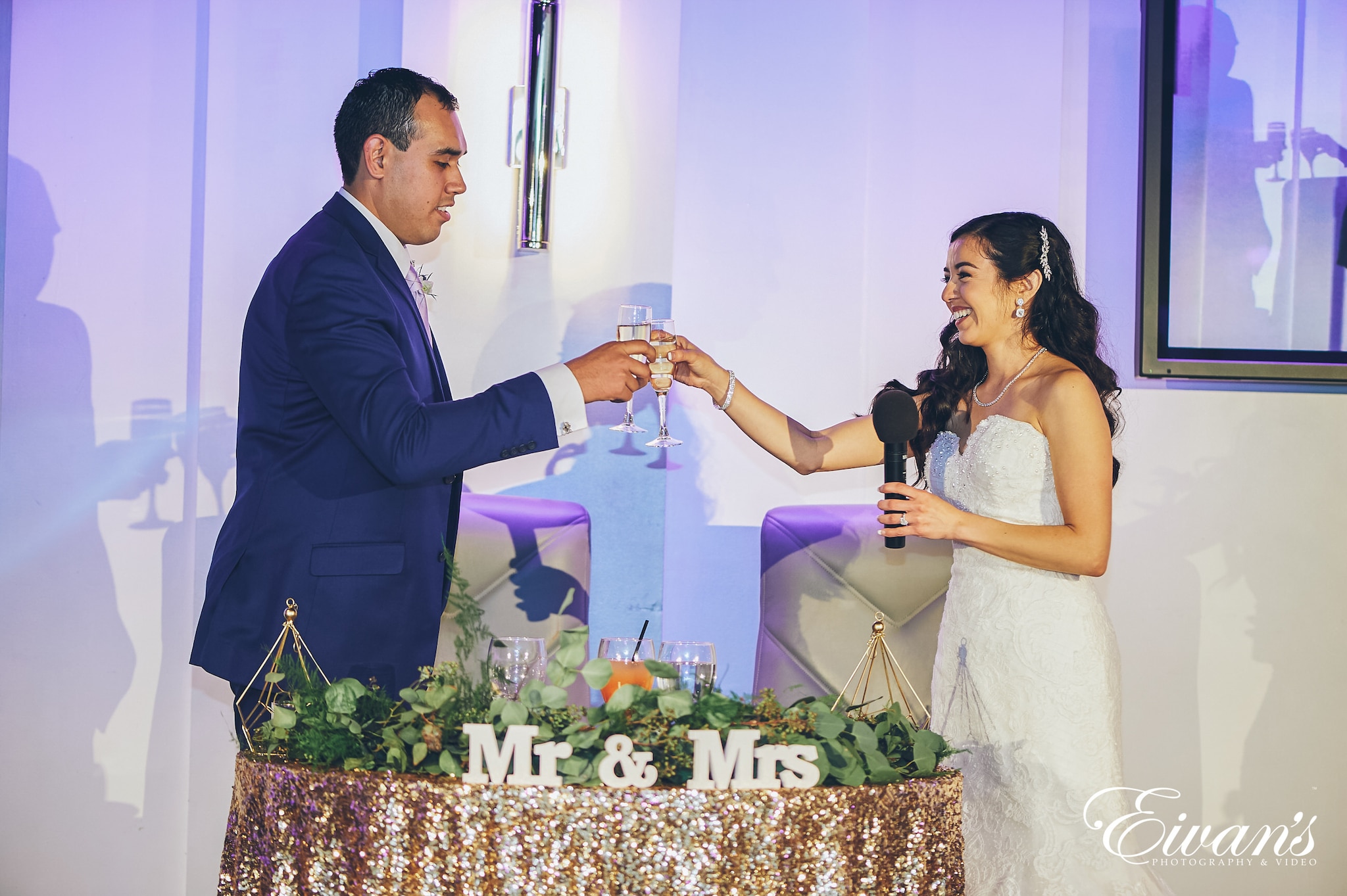 man and woman holding champagne glasses