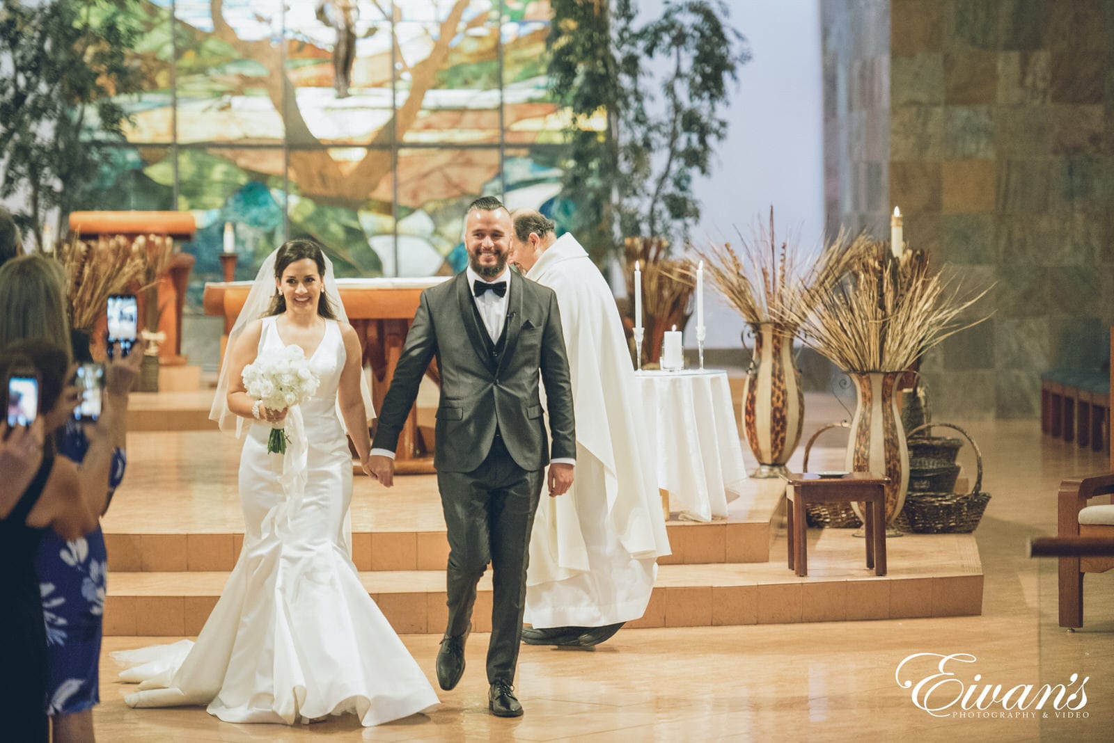 married man and woman walking down the aisle