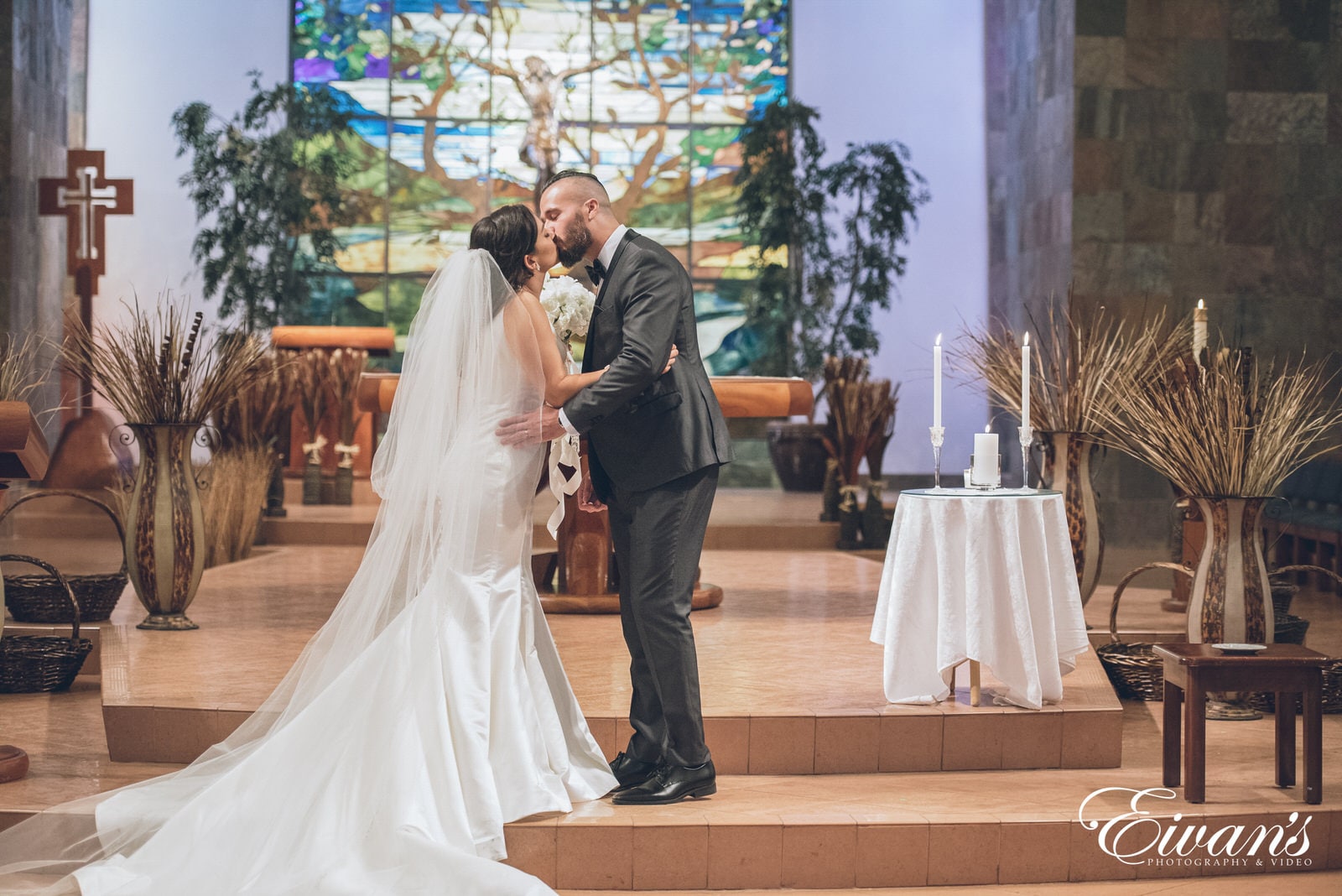 married man and woman kissing