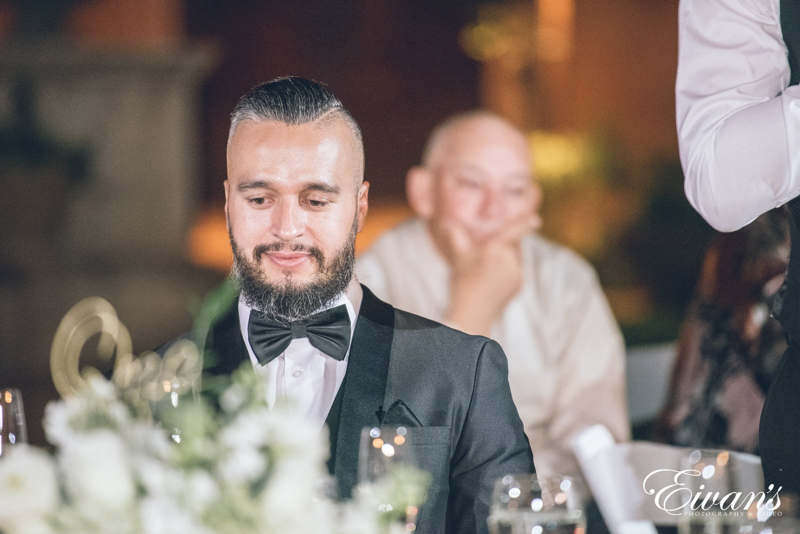 groom at the table