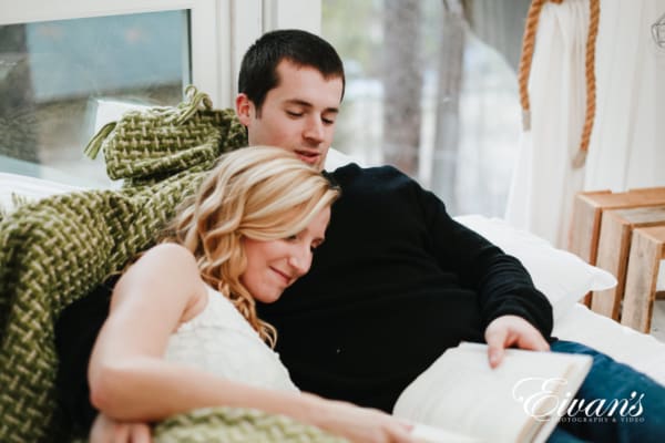 couple at home, sitting comfortable, during engagement photoshoot