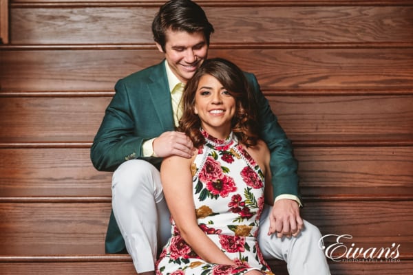 engagement couple sitting on stairs