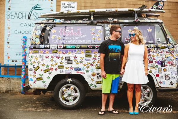 candid photo of couple in colorful outfit