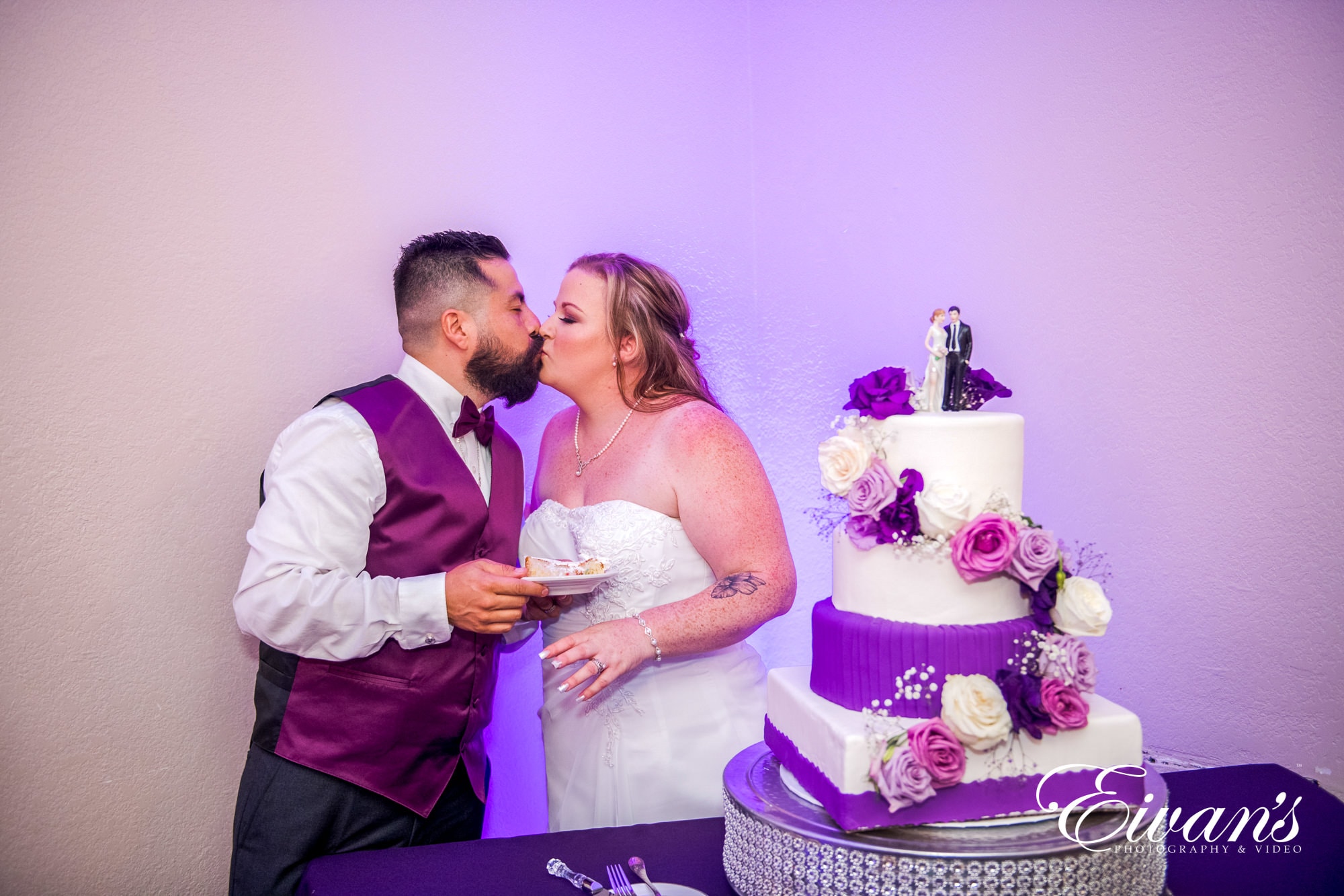 bride and groom wear lilac and violet