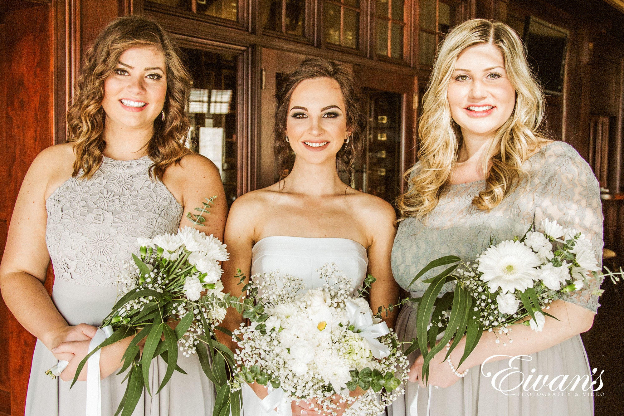 bride and bridesmaids wearing silver and grey colors