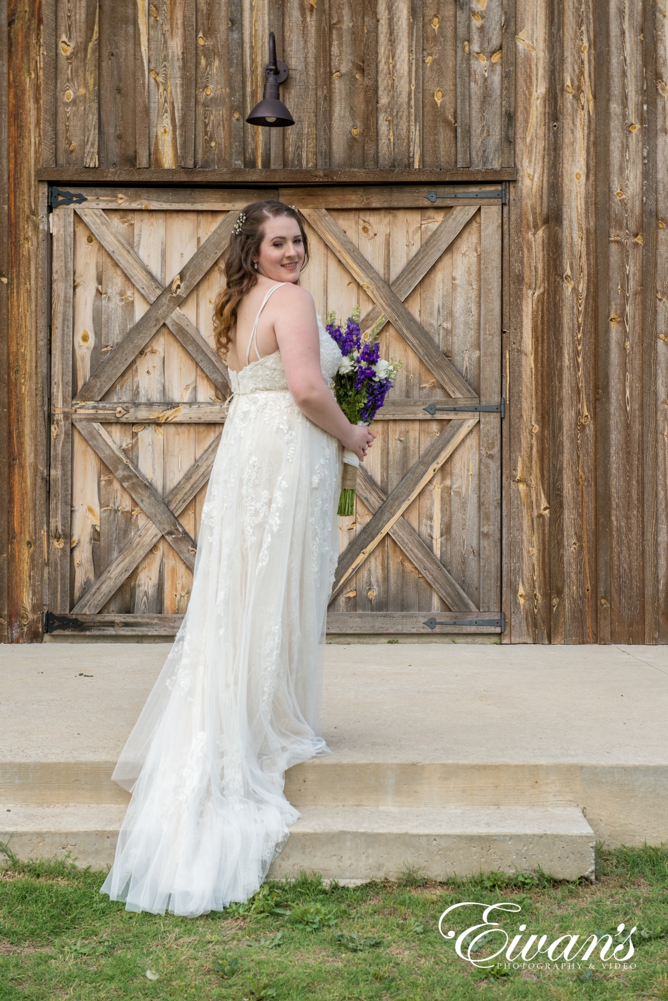 bride posed on the barns patio