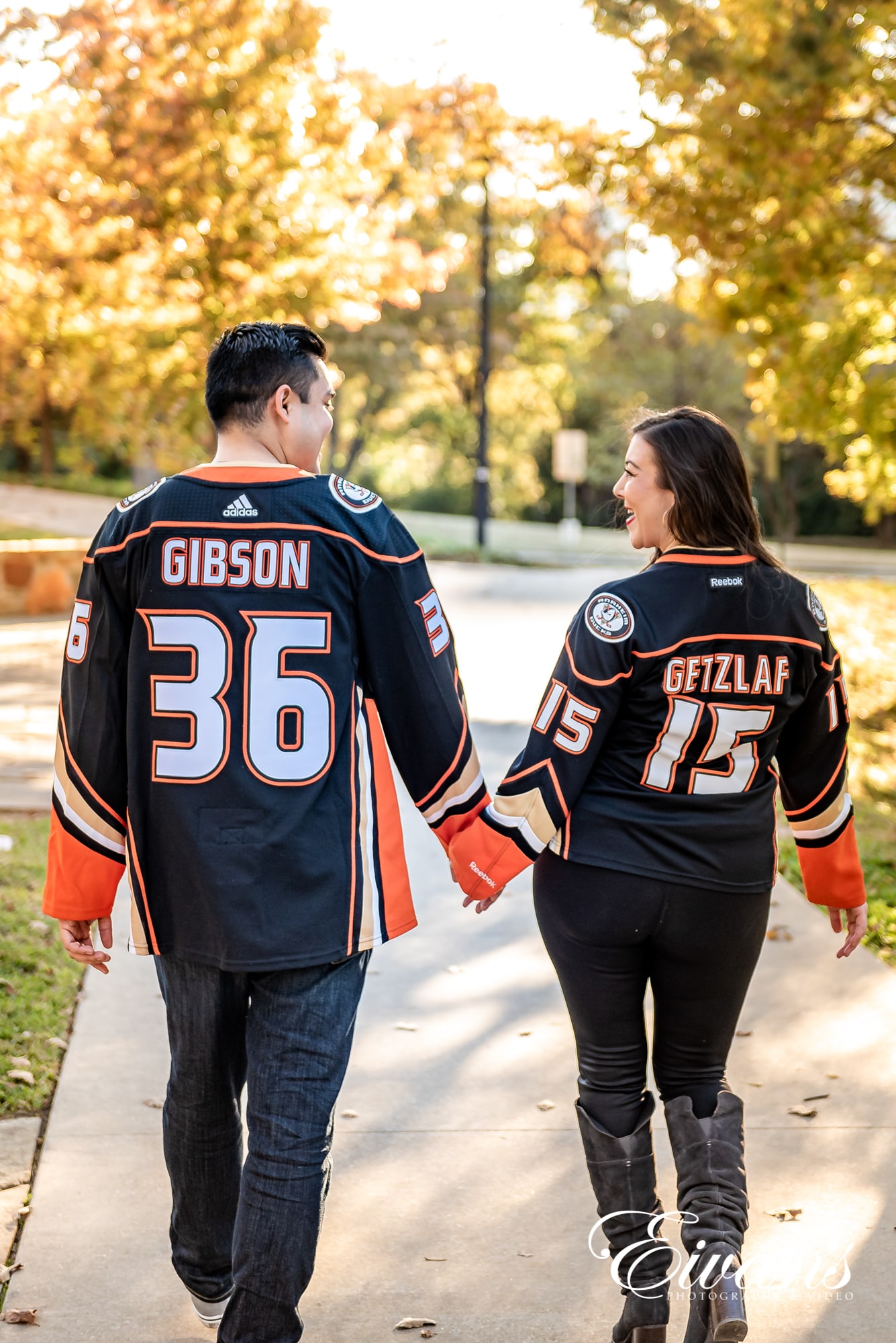 same couple posed in different outfits while walking away from the camera