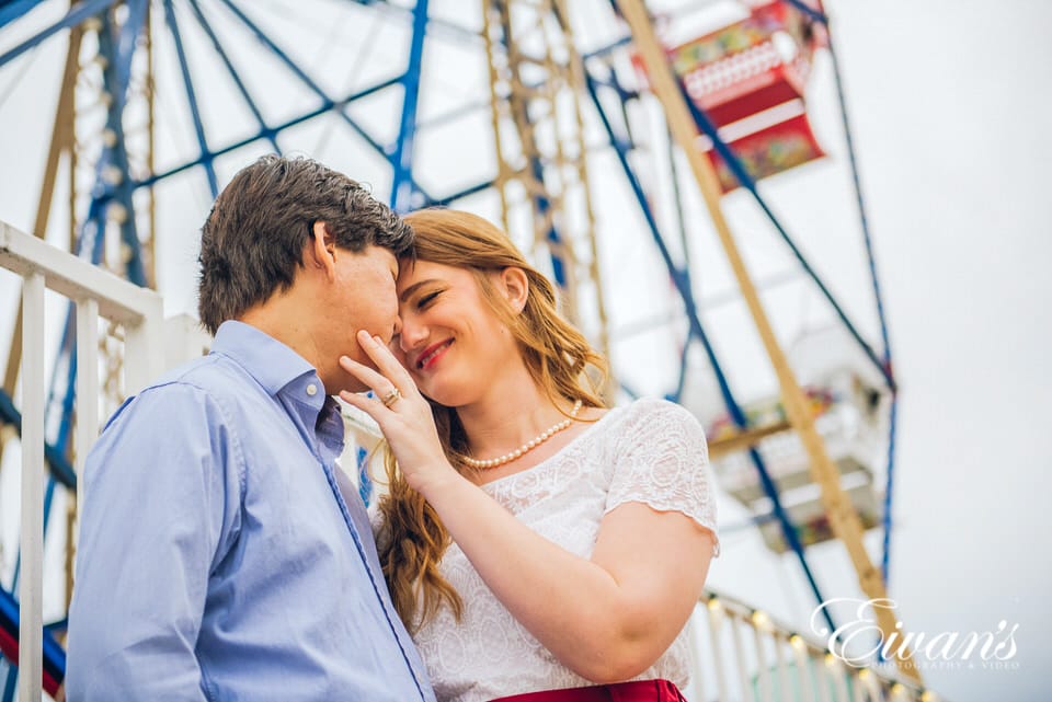 cute-engagement-photos Image of an engaged man and woman at the carnival