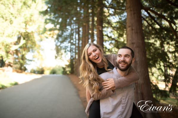 Image of an engaged couple in the woods